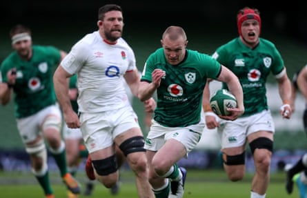 Ireland’s Keith Earls runs through to score their first try of the match.