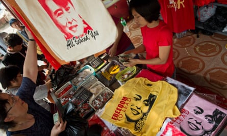 A vendor displays T-shirts bearing the portrait of Aung San Suu Kyi with slogans ‘freedom to lead’, ‘our leader’, at the NLD party headquarters in Yangon.