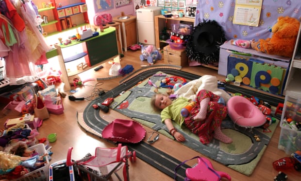 Young Girl lying in her Playroom.
