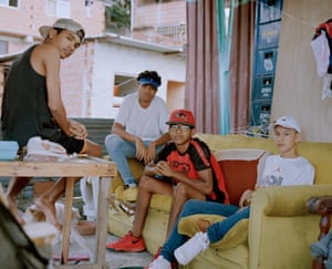 Gerson with his friends and cousin at the rooftop of their home late in El Valle Caracas, 2019