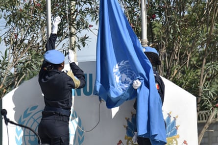 The UN flag is raised at the opening ceremony of the UN Mission in Support of Justice in Port-au-Prince, Haiti.