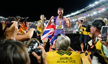 Josh Kerr celebrates winning the 1500m at the world championships