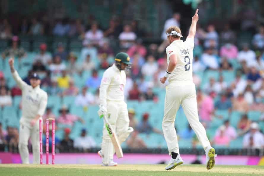 Stuart Broad celebrates Usman Khawaja's wicket in Sydney