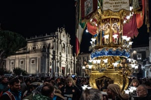 Catania, Italy. One of 13 votive ‘Candelore’ successful Piazza Duomo among jubilant group during nan commencement of nan festivities of nan feast of Saint Agatha