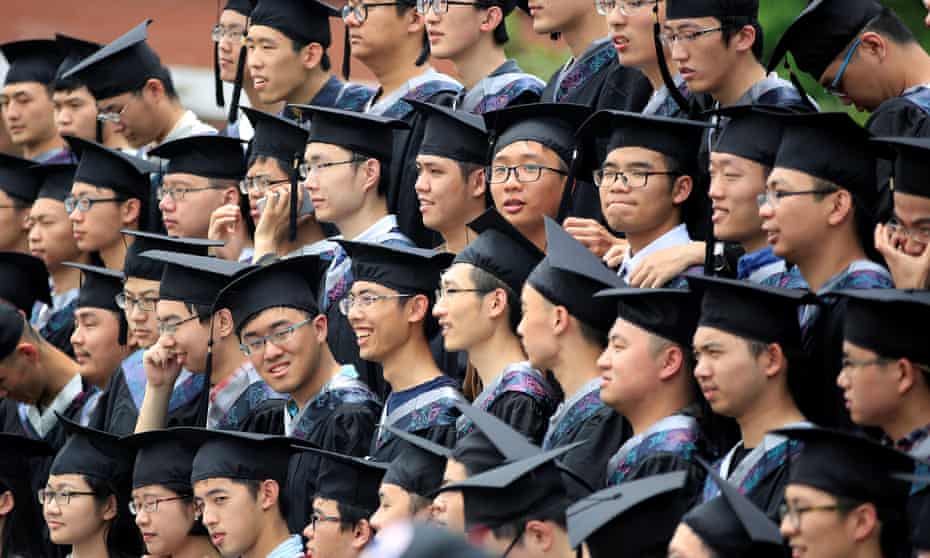 Graduates pose for group pictures at Fudan University in Shanghai