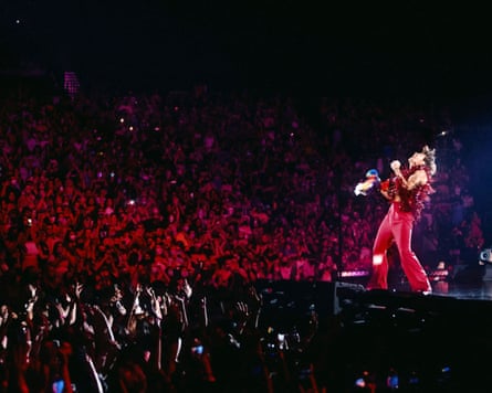 Harry Styles on stage in stadium