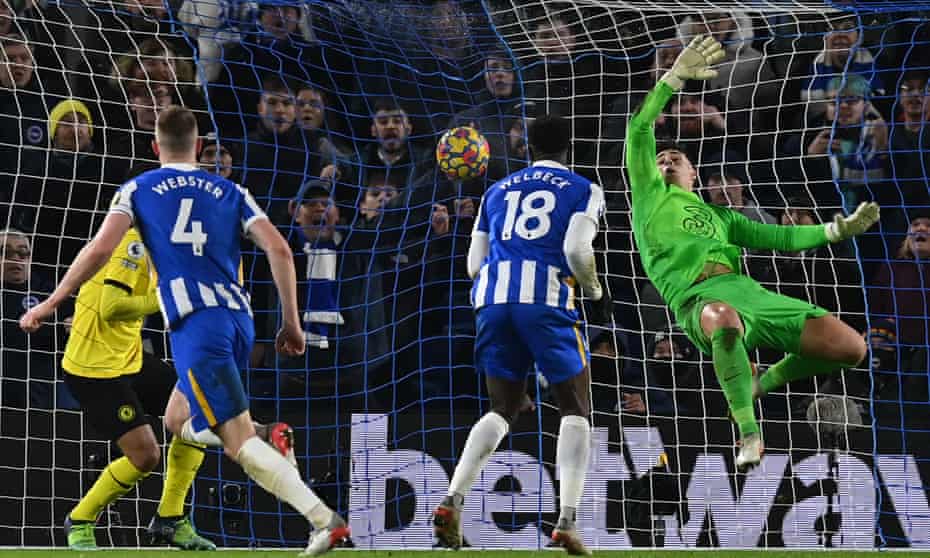 Brighton’s Adam Webster watches his header beat Chelsea's Kepa Arrizabalaga to make it 1-1.