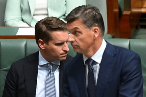 Andrew Hastie listens to opposition leader Angus Taylor speak during question time on Monday.