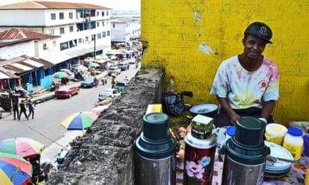 A coffee seller in downtown Monrovia.