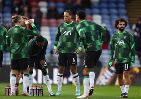 Liverpool players warm up before their game at Crystal Palace