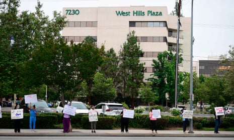 Nurses stage a protest with support from the registered nurses union, SEIU Local 121RN, outside the West Hills Hospital on 18 June in West Hills, California. 