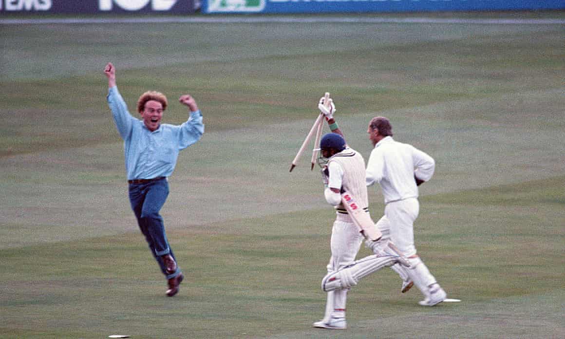 Asif Din runs towards the Lord’s pavilion with three souvenir stumps