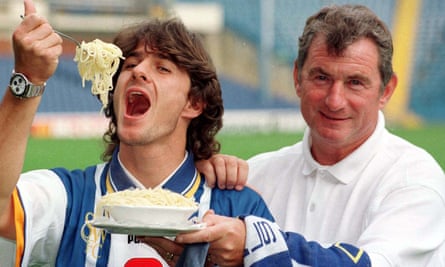 Benito Carbone pretends to eat pasta in his Sheffield Wednesday unveiling alongside David Pleat in 1996