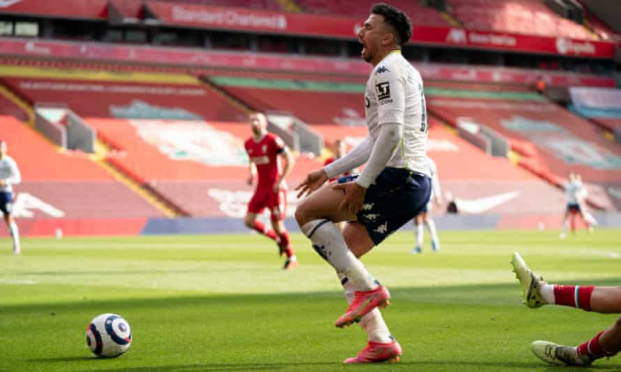 Aston Villa’s Mahmoud Trézéguet reacts to being tackled by Liverpool’s Trent Alexander-Arnold