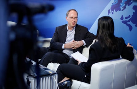 Kirill Dmitriev is interviewed on TV by a journalist