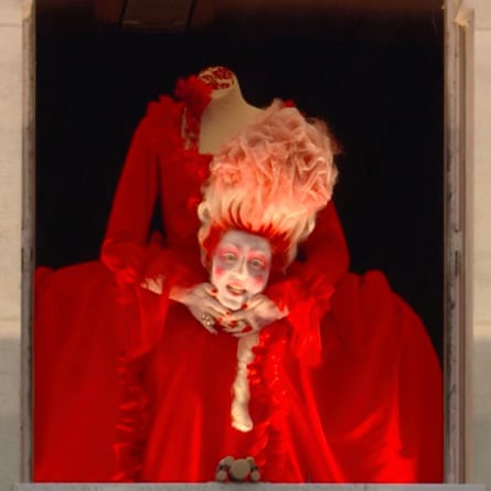 Singing queen … Marie Antoinette performs from a window in the Conciergerie.