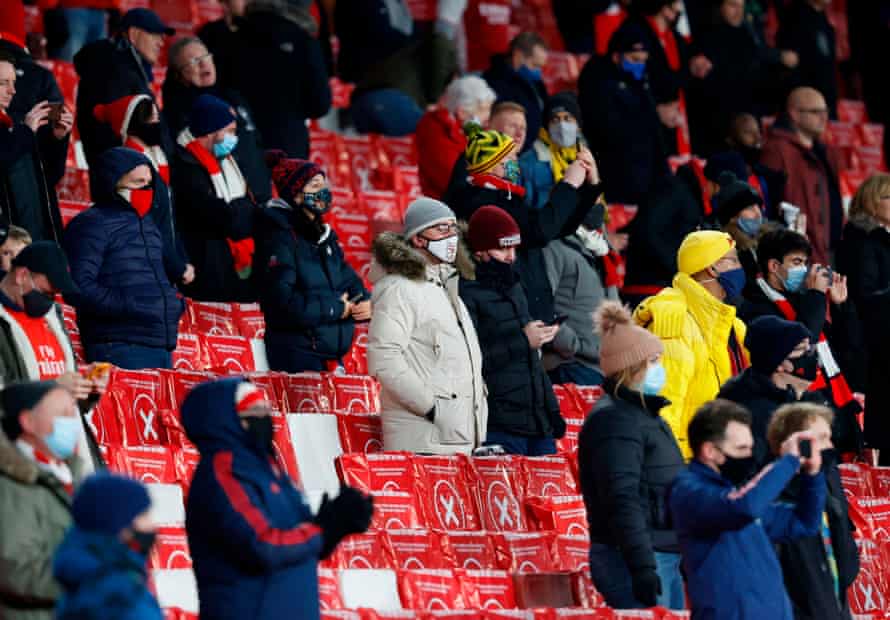 Arsenal fans at the Emirates for a Europa League match against Rapid Vienna in December, during the short-lived return of crowds