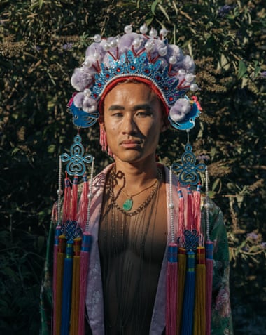 portrtait of vendor wearing bright-colored headdress