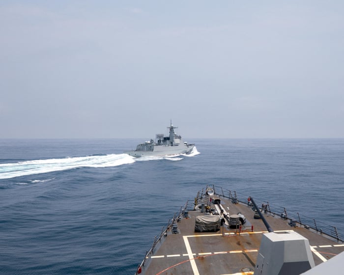 Chinese destroyer opens fire in waters claimed by Japan as tensions rise in the South China Sea