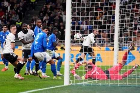 Germany's Leon Goretzka, background right, scores his side's second goal.