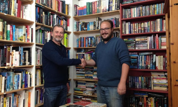 Retiring owner of Bookends bookshop in Cardigan, Paul Morris with new owner Ceisjan van Heerden.