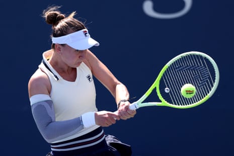 Barbora Krejcikova hits a return against Elena-Gabriela Ruse.