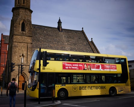 A yellow bus outside Bolton Interchange