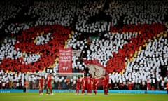 Liverpool fans hold up signs paying tribute to the 97 victims of the Hillsborough disaster.