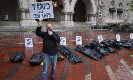 A man protests Donald Trump’s response to the coronavirus pandemic on 23 April. 