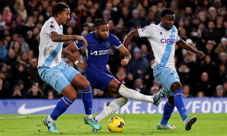 Crystal Palace's Marc Guehi and Chris Richards close down Chelsea's Christopher Nkunku.