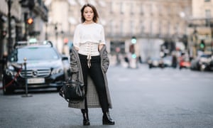A street style star in a Zara corset top during Paris fashion week, January 2017.