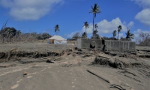 Covid live news: France to ease some restrictions; tsunami-hit Tonga enters lockdown | World news 5 ash covered and flattened buildings in Tonga