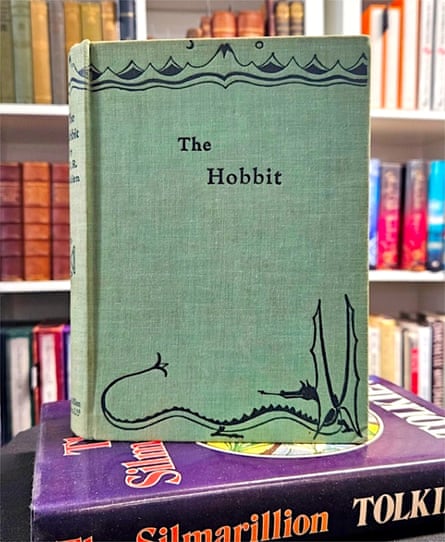 A first edition copy of The Hobbit, bound in light-green cloth, with black lettering
