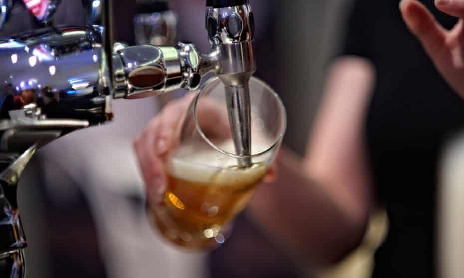 A beer is poured at a pub