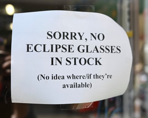 A sign in a shop in Falmouth, one of many in the town advising shoppers that no stock remains of solar eclipse glasses.