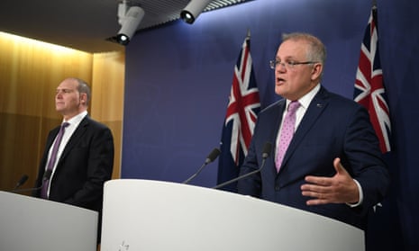 The head of Australia’s Covid-19 commission Nev Power and prime minister Scott Morrison
