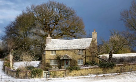 cottage with light snow