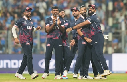 USA’s Ali Khan, second right, celebrates with his teammates after the wicket of India’s Abhishek Sharma