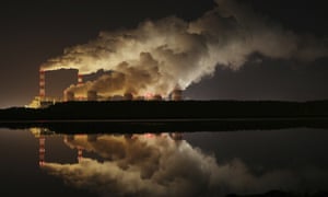 FILE - In this Wednesday, Nov. 28, 2018 file photo, plumes of smoke rise from Europe’s largest lignite power plant in Belchatow, central Poland. As politicians haggle at a U.N. climate conference in Poland over ways to limit global warming, the industries and machines powering our modern world keep spewing their pollution into the air and water. The fossil fuels extracted from beneath the earth’s crust _ coal, oil and gas _ are transformed into the carbon dioxide that is now heating the earth faster than scientists had expected even a few years ago. (AP Photo/Czarek Sokolowski)