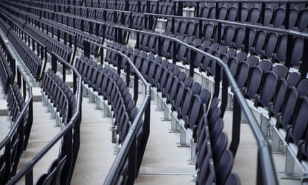 Some sections have railings between the seats in preparation for the potential introduction of safe-standing