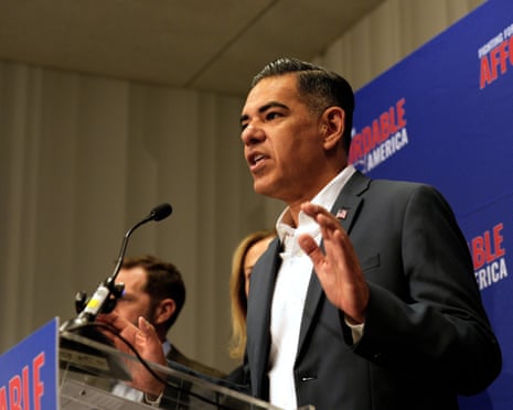 a man speaks into a microphone