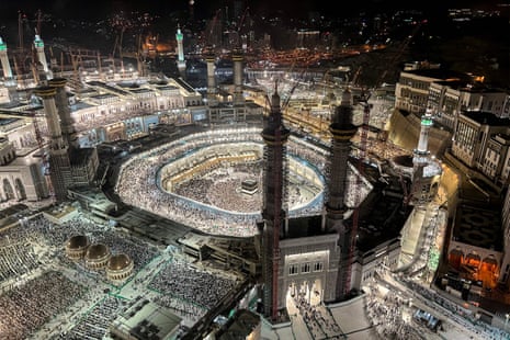 Muslim worshippers and pilgrims gather around the Ka’bah, Islam's holiest shrine, in the holy city of Mecca on 22 June, as they arrive for the annual hajj pilgrimage. 