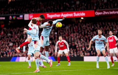 Arsenal’s Mikel Merino (rear left) heads the home side into the lead.