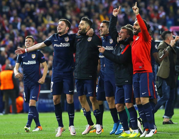Atlético Madrid players celebrate after the match.