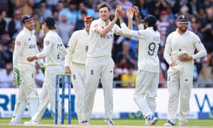 Craig Overton (centre) celebrates after taking the wicket of Ravi Jadeja.