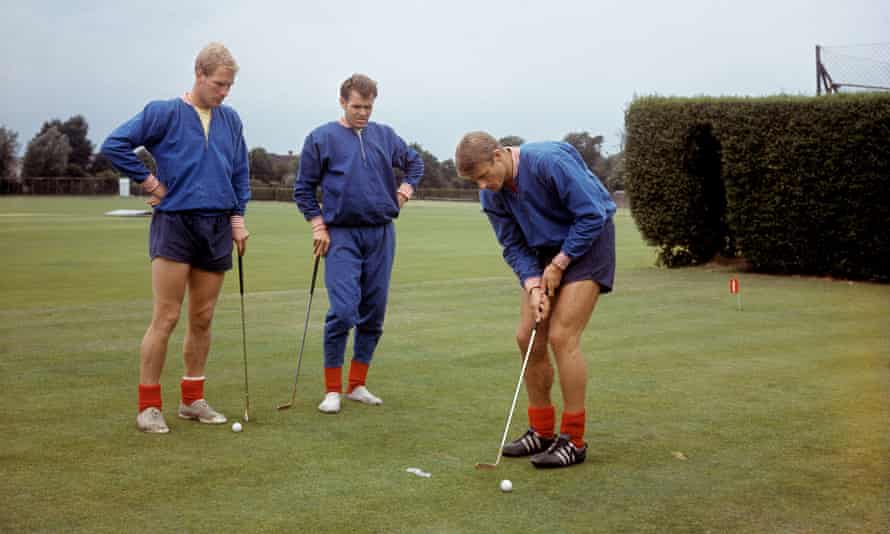 Ron Flowers watches with John Connelly as Roger Hunt lines up a putt on the eve of the 1966 World Cup final