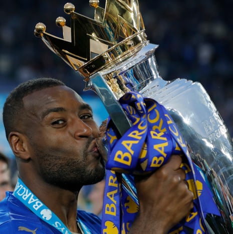 Leicester City’s Wes Morgan kisses the trophy.