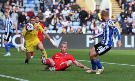 Barry Bannan scores Sheffield Wednesday’s second goal against Wycombe.