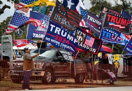 Dozens of pro-Trump flags at a rally read messages like ‘Trump 2024 No More Cheating’ and ‘Let’s Go Brandon.’