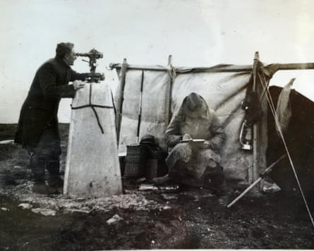 Taking observations from a Trig pillar in the 1930s